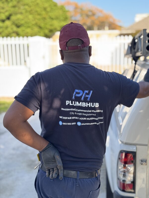 Plumbhub professional plumber at service vehicle